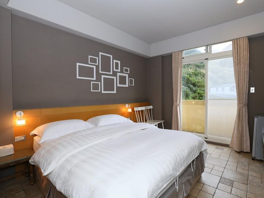 Golden101 Bed And Breakfast Цзюфэнь Экстерьер фото